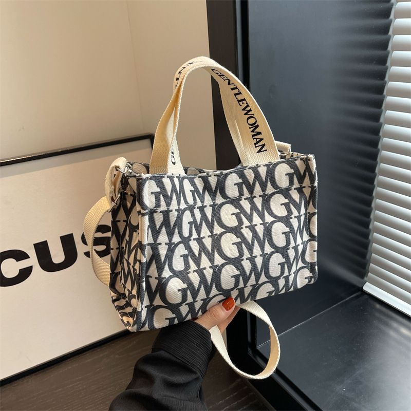 HCJ7030 Women's Fashion Niche Print Letter Canvas Bag Casual Magnetic Buckle Shoulder Bag