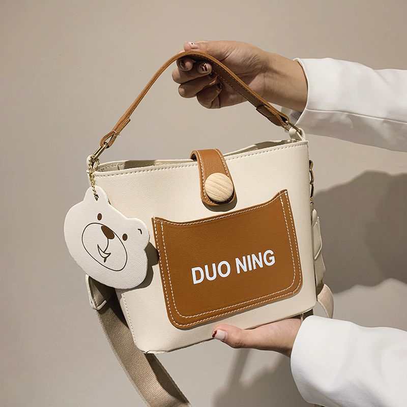 Handbag bag Women's summer 2021 new fashion women's bag net red wide shoulder strap cross-body bag versatile shoulder bucket bag

