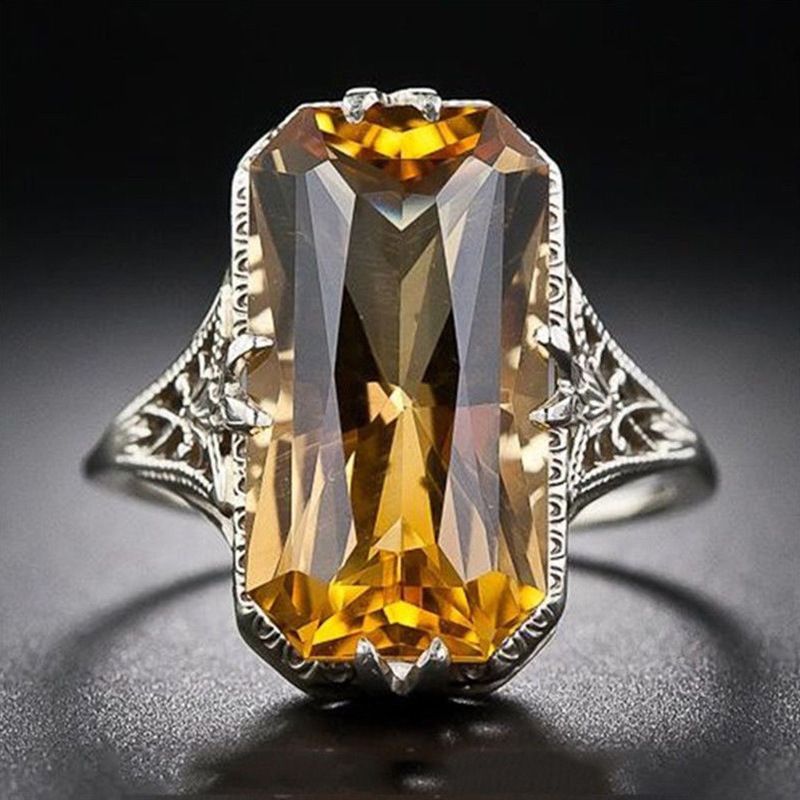 Women's Fashion Yellow Crystal Ring Hollow Carved Pattern Ring