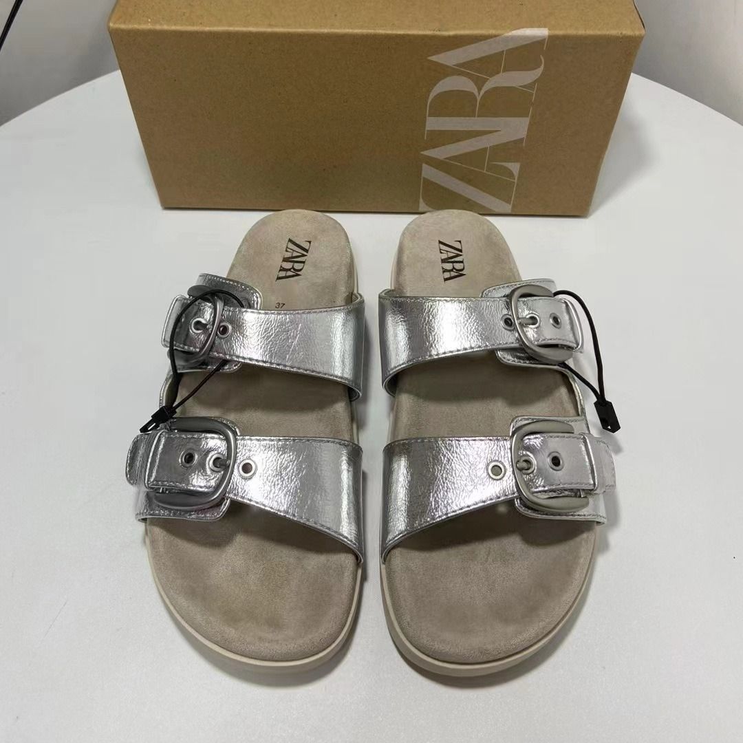 Spain 2024 summer new line with hollow women's drag silver buckle flat round head leisure outdoor sandals