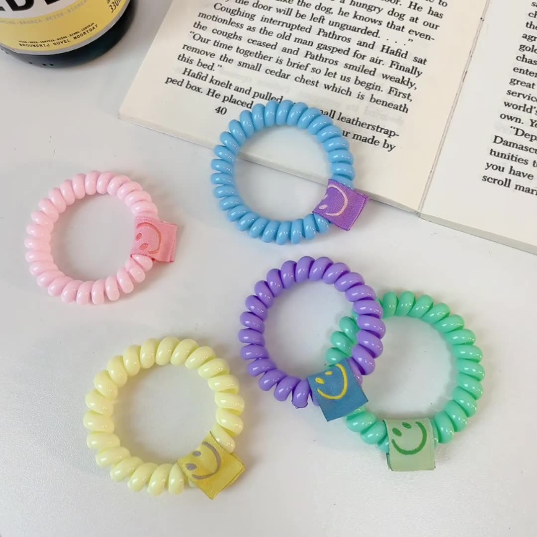 X9334 2pcs Smile Face Graphic Telephone Wire Hair Tie