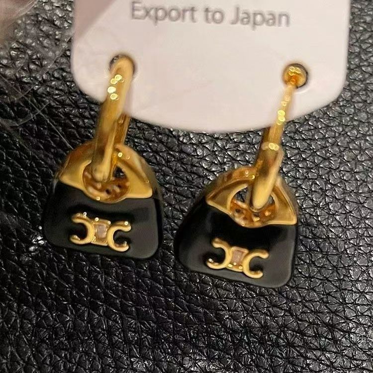 Celine high-end feel~Retro fashionable Arc de Triomphe gold and silver contrasting earrings for women, European and American light luxury earrings