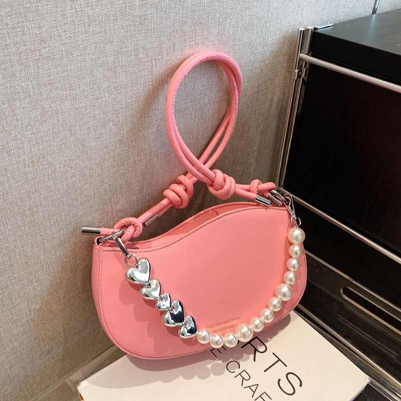 Spring and summer new niche design women's bag Korean version of fashion hand pearl chain crossbody shoulder bag DJ6105MH