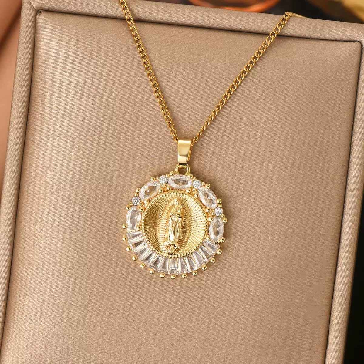 New‑arrival luxury‑style round medallion portrait necklace for women, features exquisite embossed portrait craft on round pendant, decorated with sparkling inlaid zircon around the edge. Classic gold‑tone matching chain highlights elegant temperament. Skin‑friendly material for comfortable daily wear