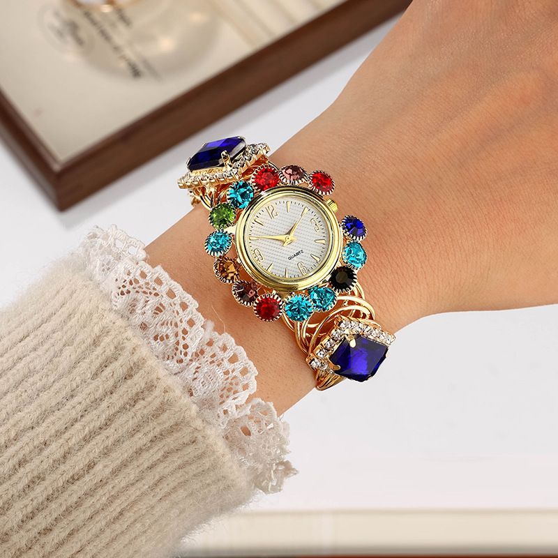 Women's Multicolor Crystal Bangle Quartz Watch, Gold-Tone with Large Blue Gemstone, Adjustable Wristwatch for Ladies, Elegant Statement Jewelry for Parties & Daily Wear

