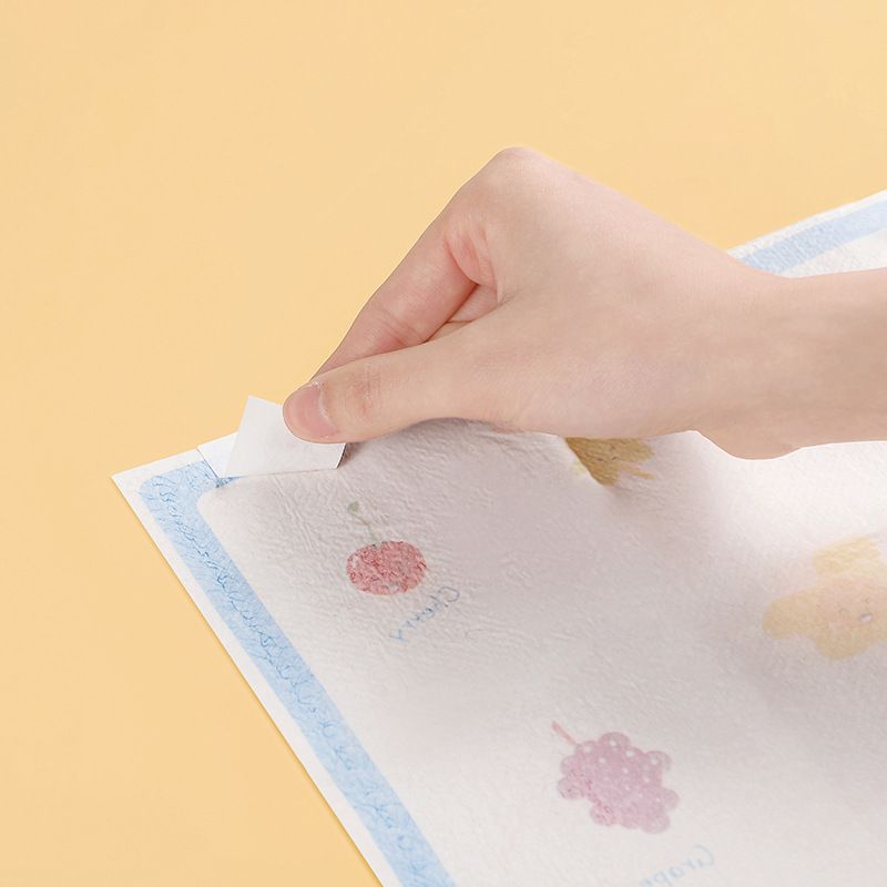 A pack Muchen children's disposable dining mats, waterproof and oil-proof, no need to wash, portable tablecloth cartoon fruit pattern.
