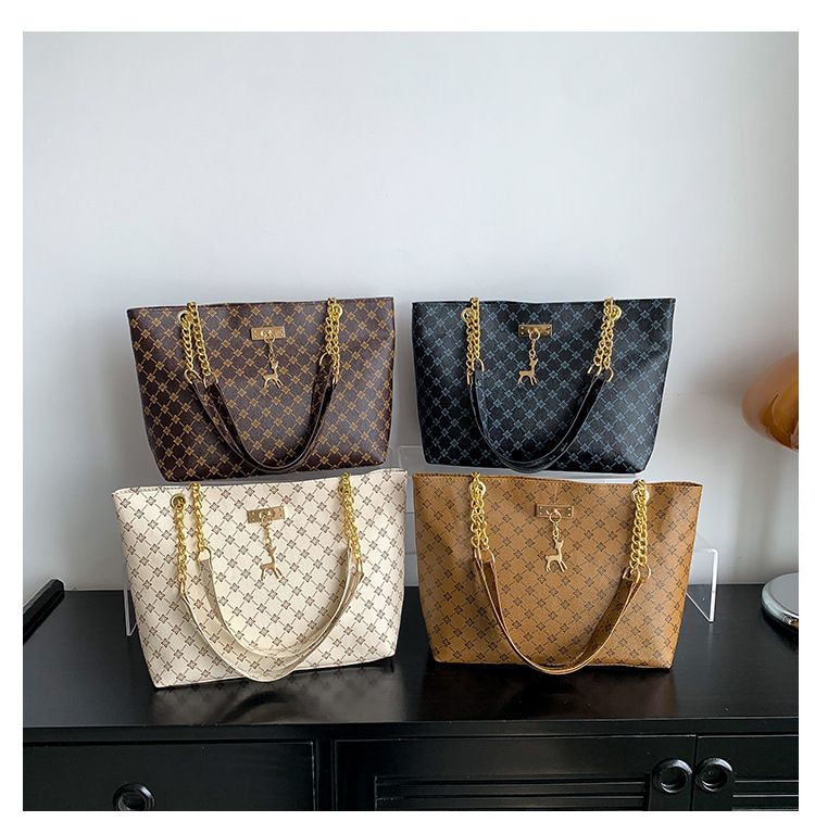 2024 new women's bag fashion commuter retro chain hand bill shoulder bag printed Tote bag 33041