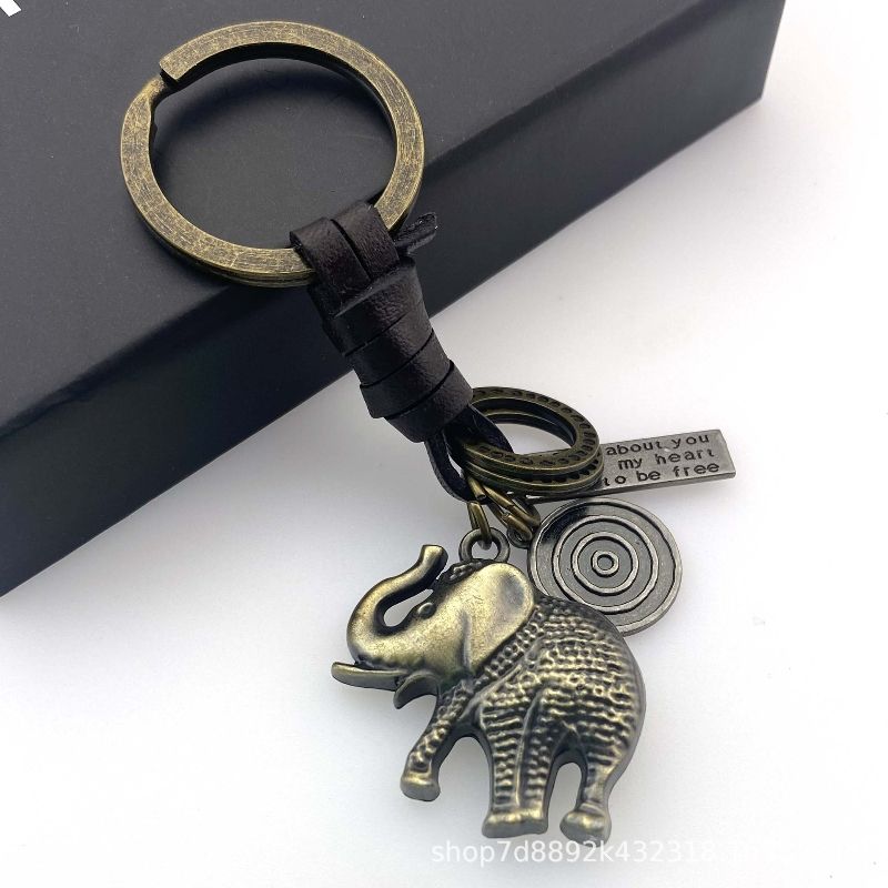 Metal antique bronze hollow elephant leather keychain Woven leather pendant free shipping key chain