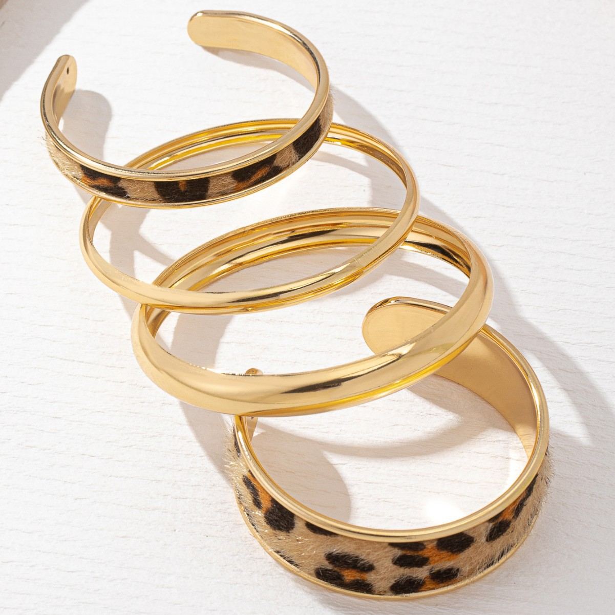 4-Piece Stackable Gold Tone Bangle Set, Minimalist Plain & Leopard Print Design, Open & Closed Cuff Style, Versatile Layered Bracelets for Women, Ideal for Daily & Casual Wear
