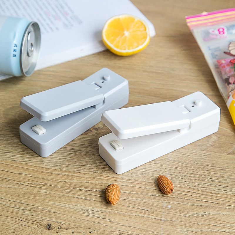 Home Mini Portable Sealing Machine Dual Use Plastic Bag Hot Sealing Machine USB Charging Hand Press Snack Bag Sealer