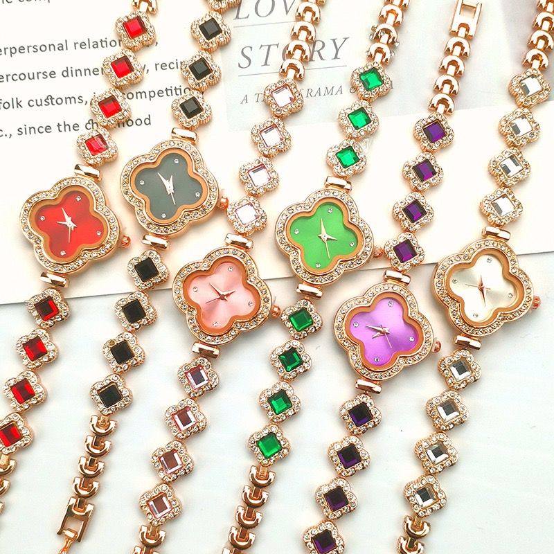 Women's watch with rose gold and diamond red dial four-leaf clover Bracelet watch; Fashion bracelet design