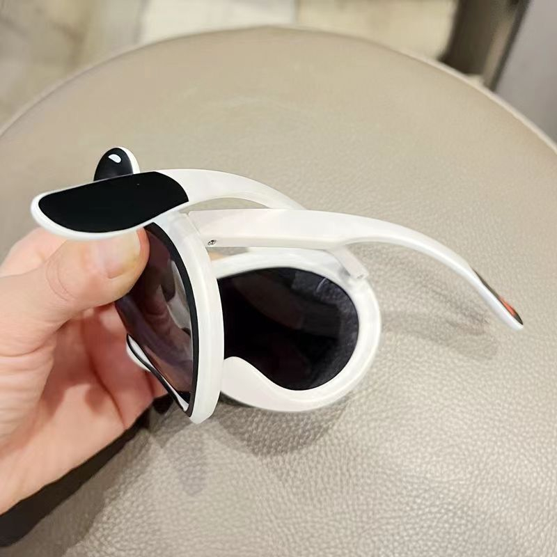 KEDOUXIN Children's sunglasses men and women children's polarized sunglasses anti-UV cute dun dun sun panda silicone glasses.