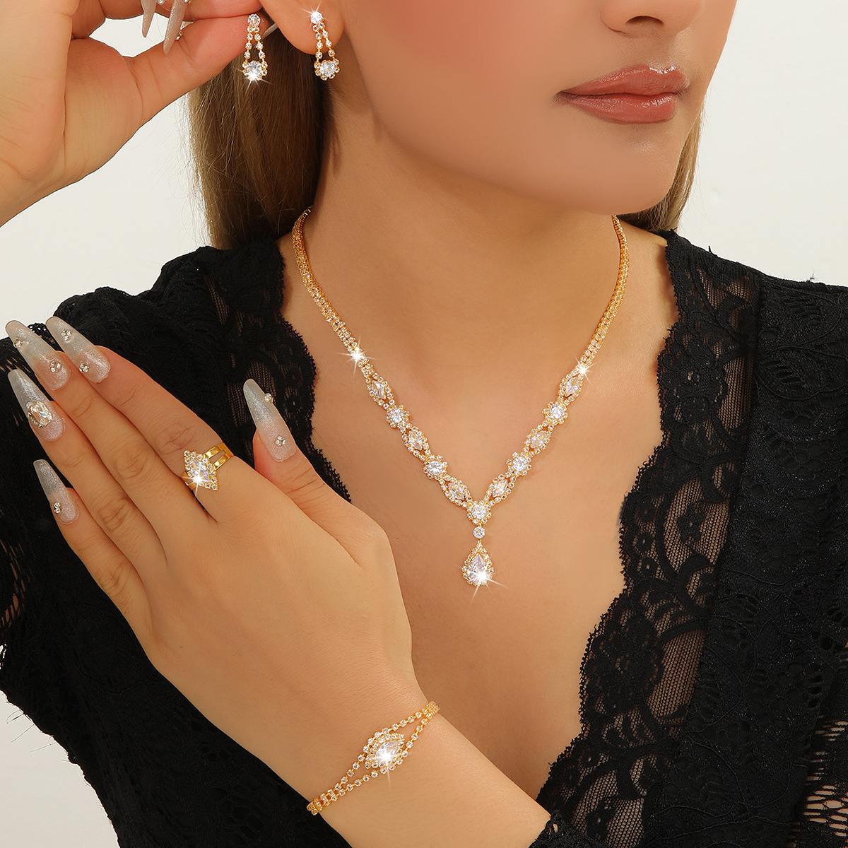 Sparkling Teardrop Flower Zircon 4Pcs Jewelry Set For Women, Includes Necklace Earrings Bracelet Ring, Adjustable Rhinestone Collarbone Chain, Silver & Gold Two Tone Formal Ornaments, Luxury Wedding Banquet Evening Prom Dress Matching Shiny Accessories Gift For Ladies
