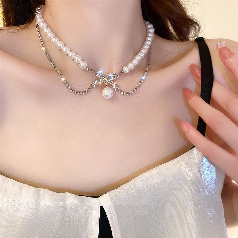 Various styles of fashion new pearl party necklace fashion high-end temperament clavicle chain net celebrity necklace clavicle chain niche dress accessoriesBow Pearl Necklace