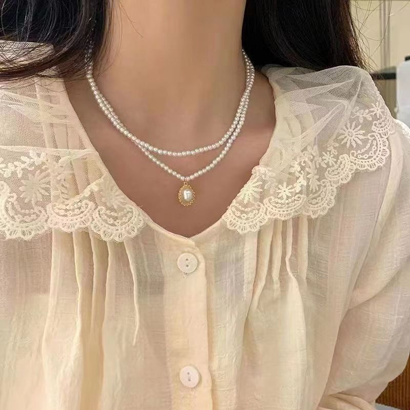 Various styles of fashion new pearl party necklace fashion high-end temperament clavicle chain net celebrity necklace clavicle chain niche dress accessoriesDouble Sunflower Pearl Necklac