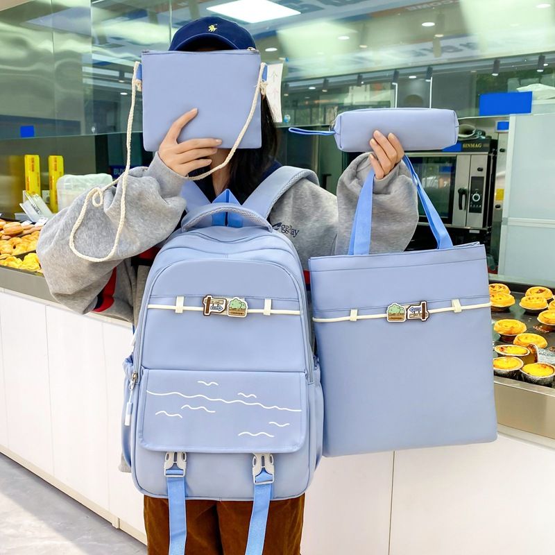 New middle school student bag Korean version high appearance level high capacity four-piece set bag students lightweight backpack SG2401