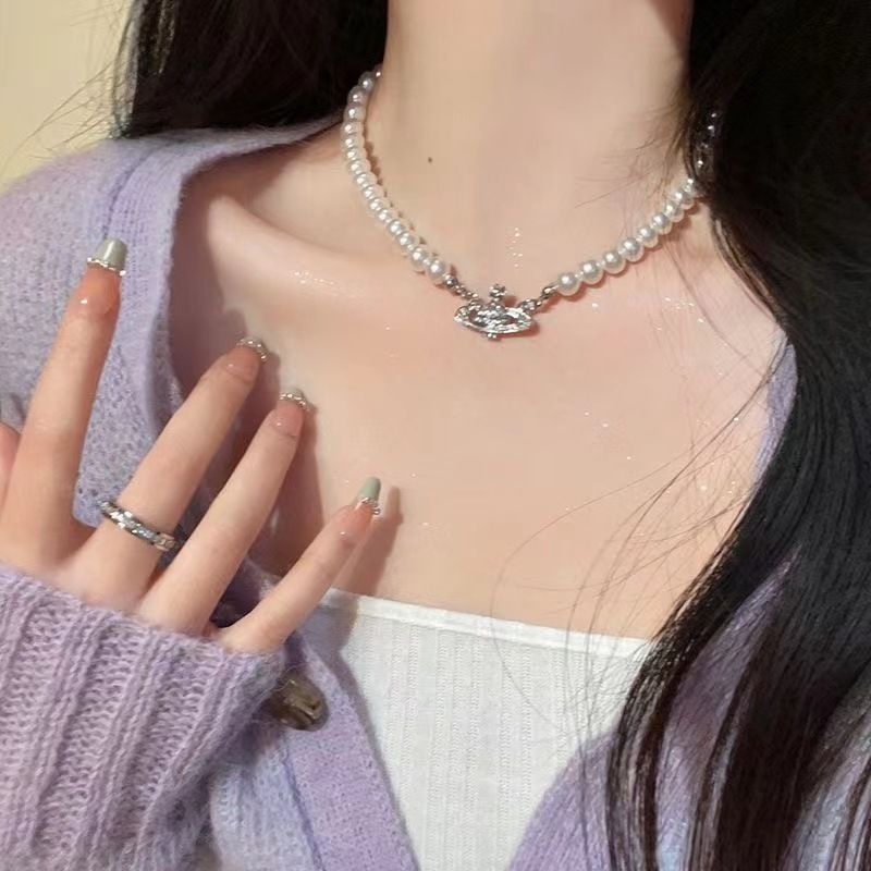 Various styles of fashion new pearl party necklace fashion high-end temperament clavicle chain net celebrity necklace clavicle chain niche dress accessoriesPluto Pearl Necklace