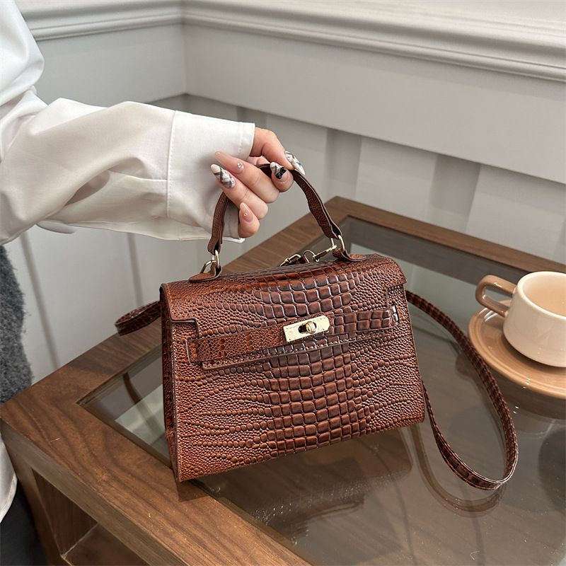 The 2025 new model of the European and American fashion trend Kelly handbag, a retro stone-patterned crossbody bag with a trendy single-shoulder women's bag