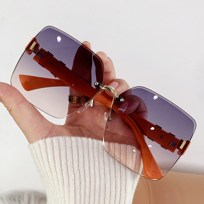 8824 Women's New Fashion Rimless Sunglasses UV Blocking Sunglasses