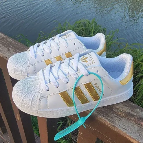 Adidas shell outlet toe gold stripes