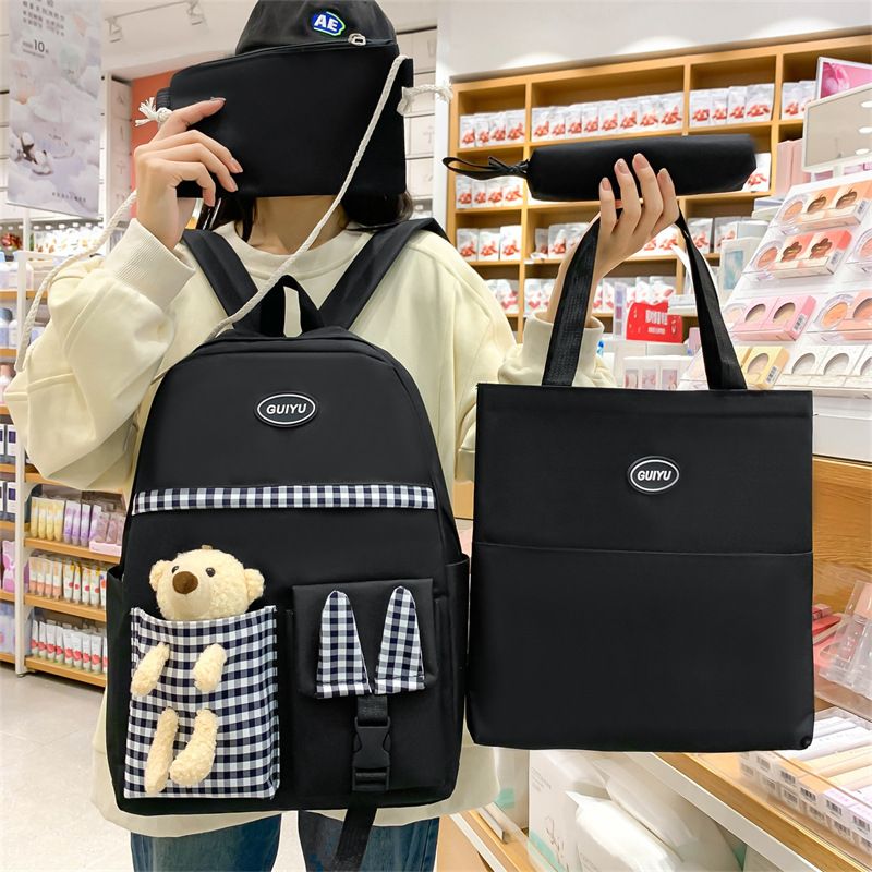 Small fresh soft sister backpack school bag make-up bag four-piece bear doll backpack SG5011