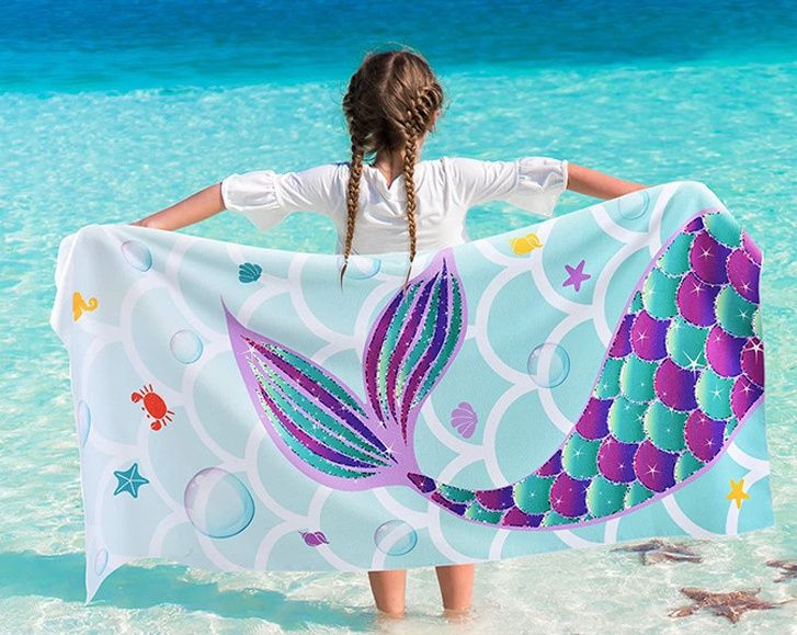 Printed beach towel made of cartoon fabric. Children's ultra-fine fiber bath towel with excellent water absorption.
