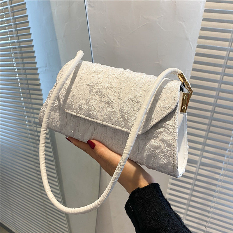 This year's popular small bag female summer 2021 new fashionable pleated armpit bag INS niche senior shoulder bag


