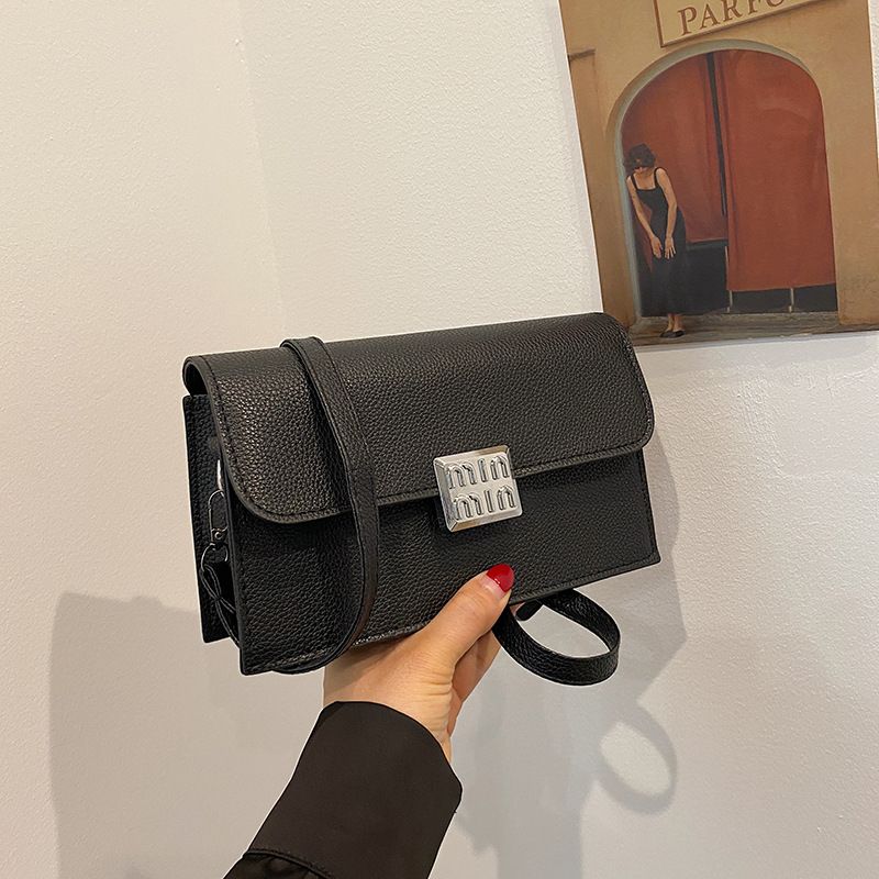 Pure color foreign style simple single shoulder crossbody bag bag female 2025 new niche design all kinds of ins small square bag
