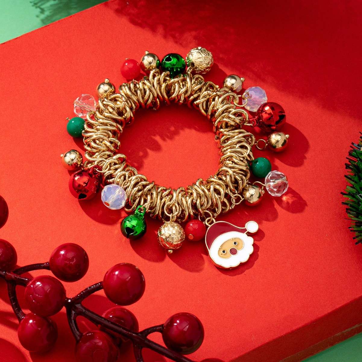 Christmas Themed Stretch Bracelet with Santa Claus Charm, Red & Green Bells, Multicolor Beads, Gold-Tone Elastic Coil Design, Festive Holiday Jewelry for Women
