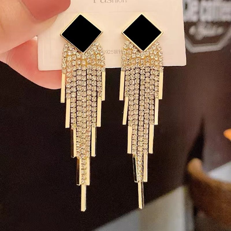 New rhinestone long tassel style Super flash earrings 119