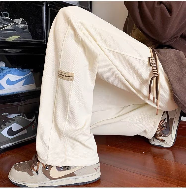 · Men's Autumn New Versatile Casual Pants Drawstring Loose Fit Sports Pants