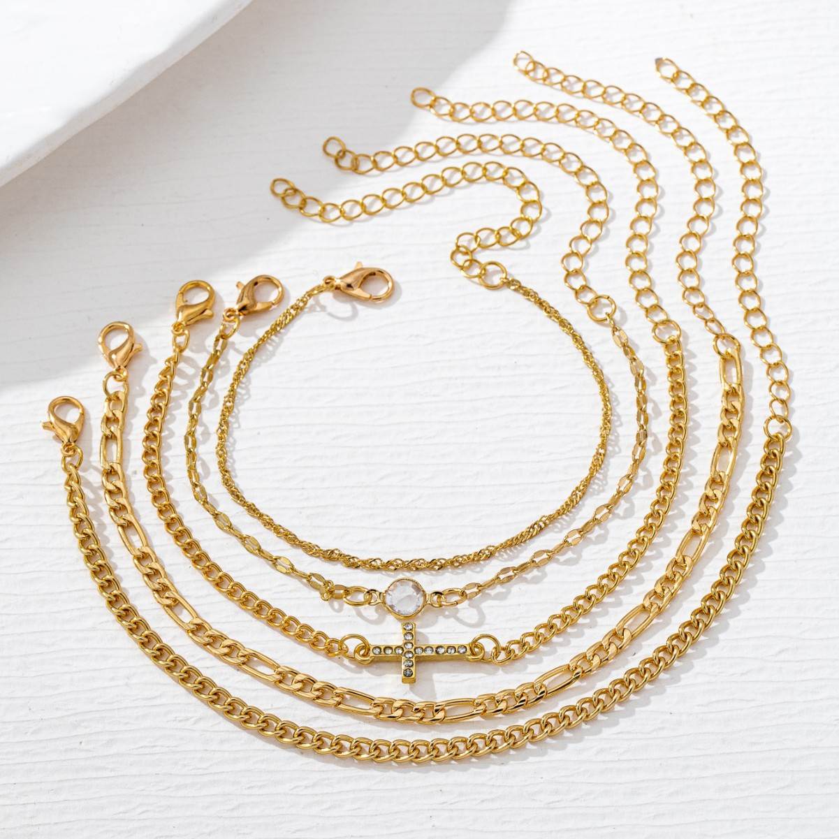 5-Piece Gold-Tone Layered Bracelet Set with CZ Cross & Paperclip Chain Designs, Stackable Minimalist Adjustable Wrist Jewelry for Women
