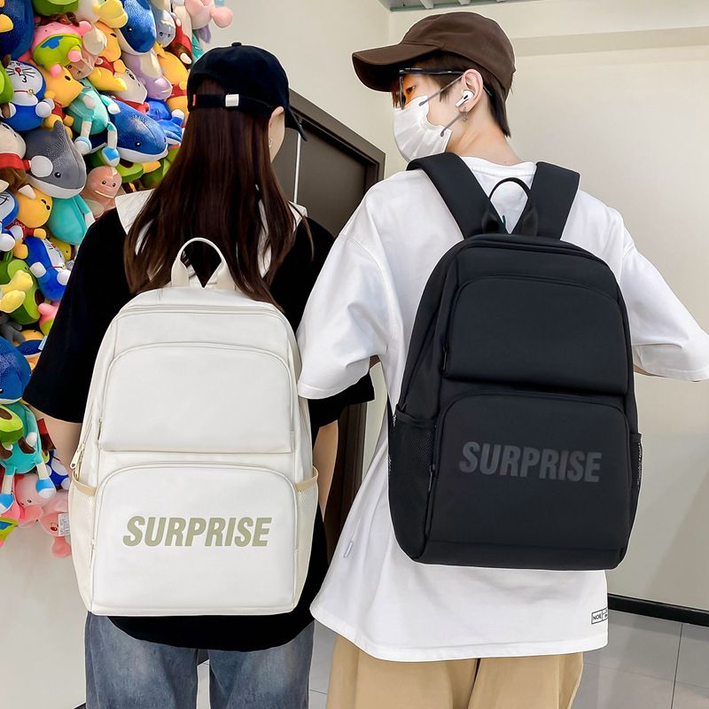 2024 new simple casual backpack school bag Korean version of solid color couple backpack middle school students KNX6008