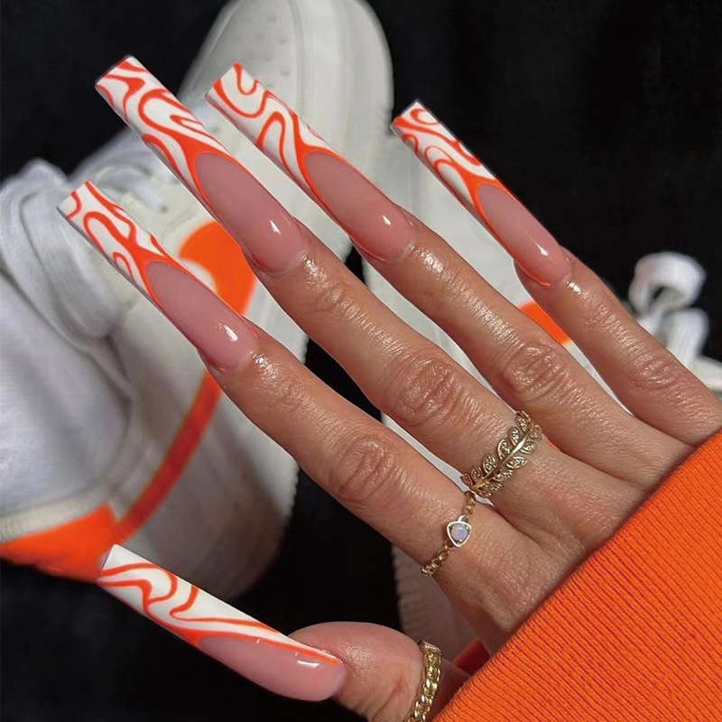 JP1739 24 Pcs Glossy Press on Nails, Super Long Coffin Orange Lines Wavy Minimalist French Fake Nails, Full Cover Artificial False Nails for Women and Girls
