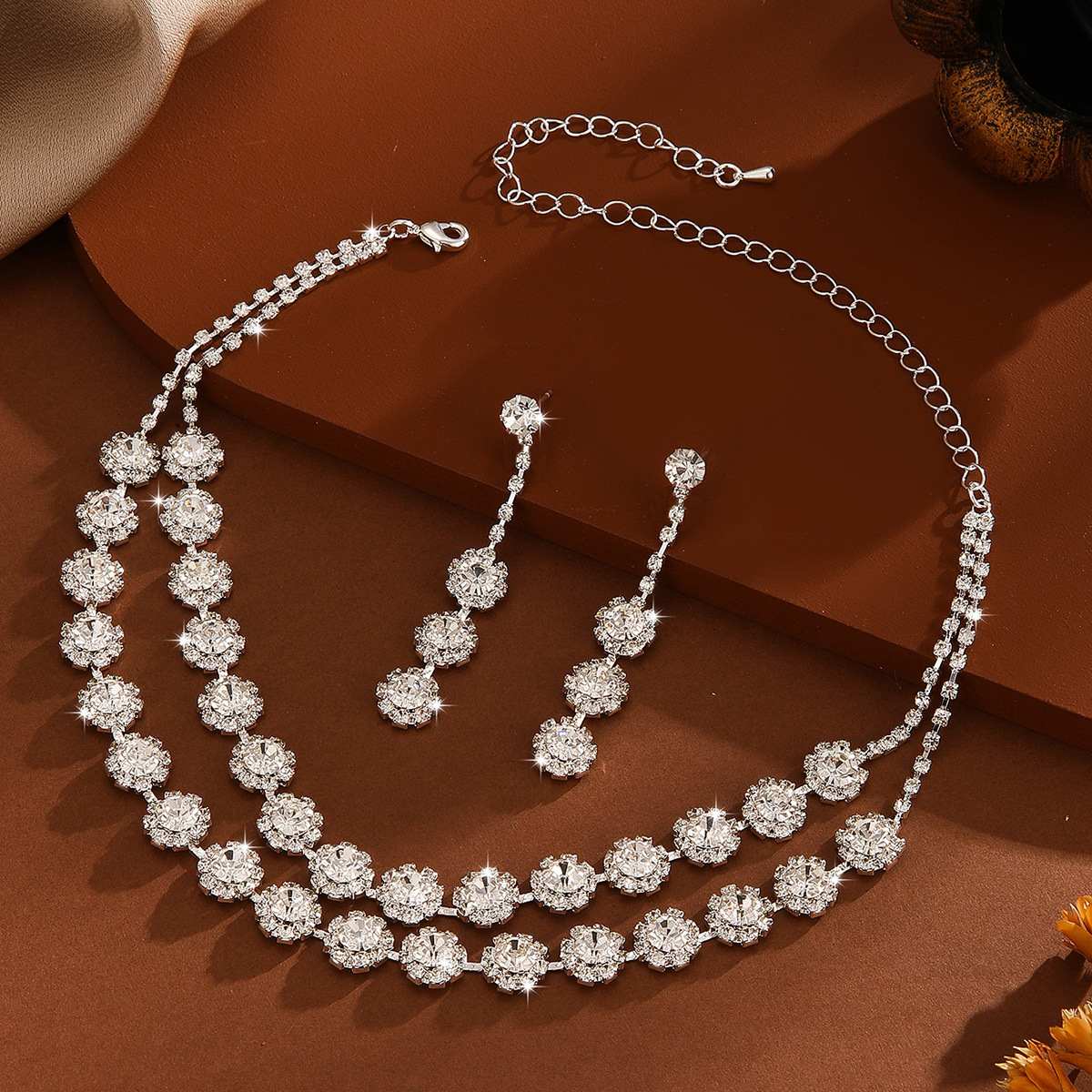 Wedding-Ready 2-Piece Layered Sunflower Cubic Zirconia Jewelry Set, Adjustable Silver Double-Row Collarbone Necklace With Clustered Floral Crystal Motifs, Matching Slim Sunflower Drop Earrings, Brilliant Faceted Sparkling Stones, Elegant Formal Ornaments Designed For Bridal Ceremonies, Luxurious Banquets, Prom Occasions, Evening Gown Styling And Themed Photoshoots, Timeless Glamorous Gift Jewelry Fit For Women’s Wedding Events And Various Special Celebrations
