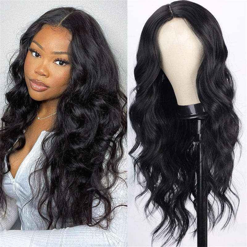 The wig woman has large wavy long curly hair in the middle and long black hair